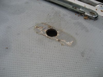 I drilled out the screw holes and dug out wet core where needed.