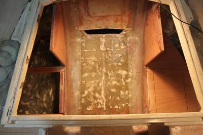 Lazarette locker.  A bulkhead will connect across the two middle pieces which will create a fully sealed stern chain locker.  This is where the hoses should enter, then drain.