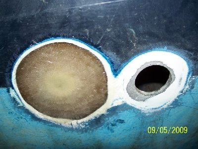 This is a view of the filled hole and the deck drain next to it